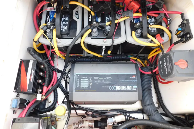 Slide: The Image of Electrical system of a 2006 Fountain 38 LX boat with batteries and wiring. - 71
