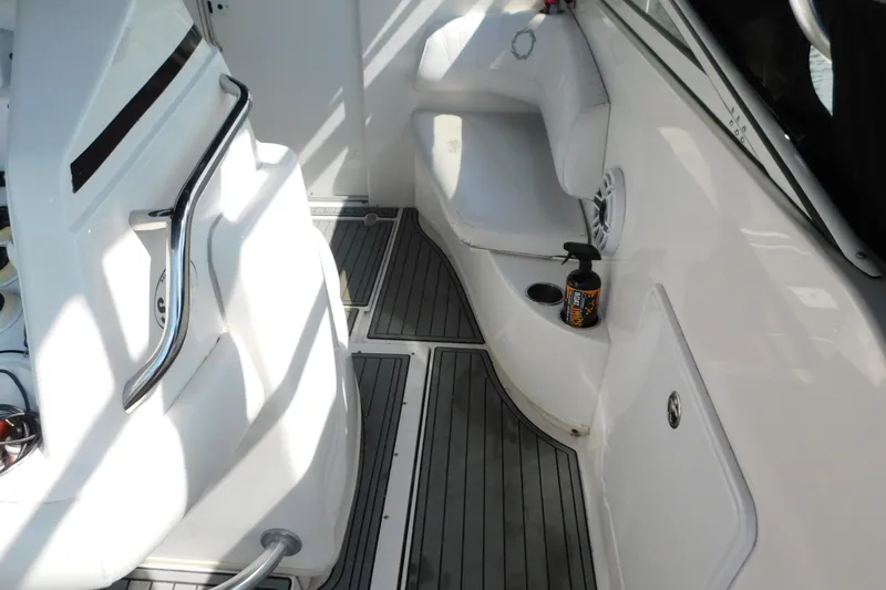 Slide: The Image of Interior of 2006 Fountain 38 LX boat with seating and handrails. - 30