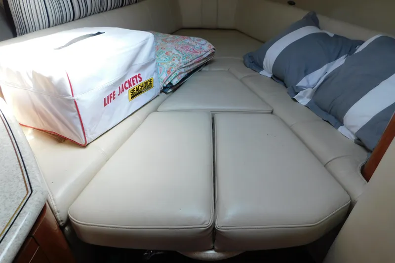 Slide: The Image of Interior cabin of 2006 Fountain 38 LX boat with life jackets and pillows. - 42