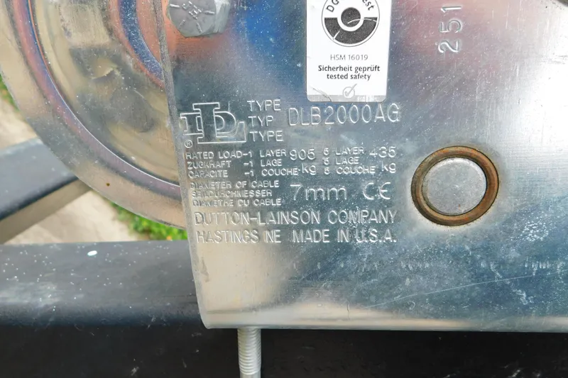 Slide: The Image of Close-up of Dutton-Lainson winch label, model DLB2000AG, showing specifications and safety certification. - 87