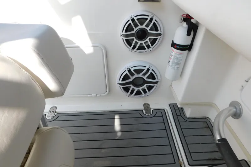 Slide: The Image of Interior of 2006 Fountain 38 LX boat with speakers and fire extinguisher. - 19