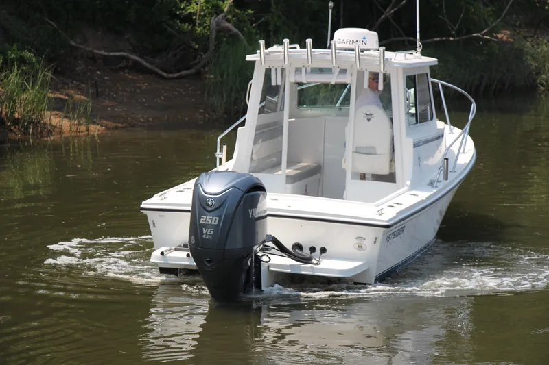 Slide: The Image of 2022 Steiger Craft 21 Miami boat with Yamaha 250 V6 engine on a calm river. - 11