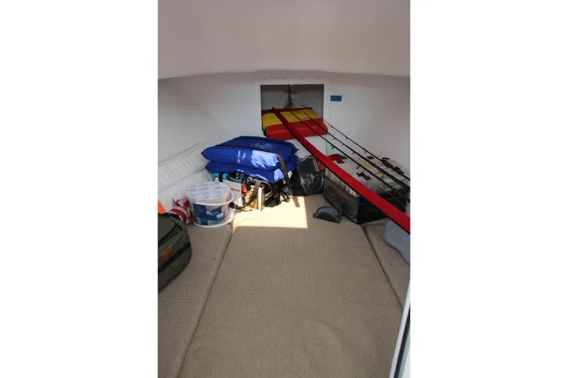 Slide: The Image of Interior of 2022 Steiger Craft 21 Miami boat with fishing gear and supplies. - 39