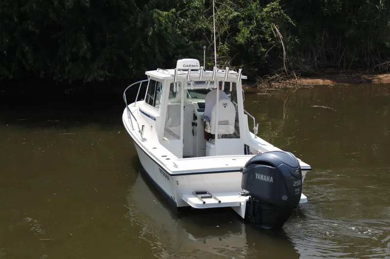Slide: The Image of 2022 Steiger Craft 21 Miami boat with Yamaha engine on calm water. - 8