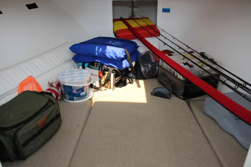 Slide: The Image of Interior of 2022 Steiger Craft 21 Miami boat with fishing gear and supplies. - 38