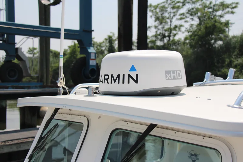 Slide: The Image of 2022 Steiger Craft 21 Miami boat with Garmin xHD radar on the roof. - 21