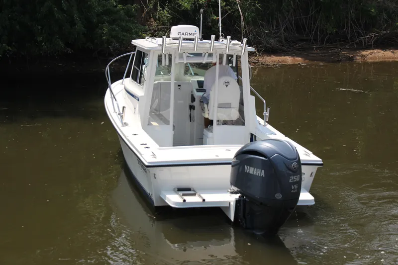 Slide: The Image of 2022 Steiger Craft 21 Miami boat with Yamaha engine on calm water. - 10