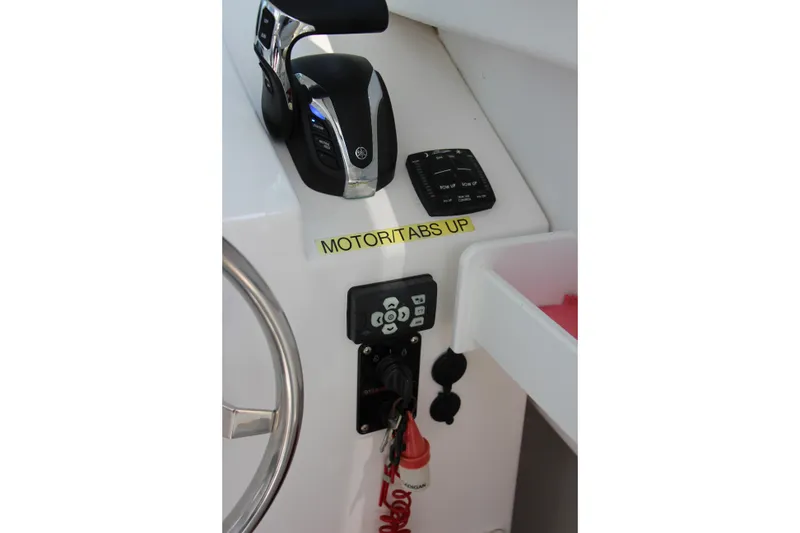 Slide: The Image of Control panel of 2022 Steiger Craft 21 Miami boat with throttle and switches. - 35