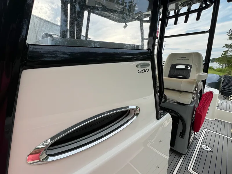 Slide: The Image of The 2020 Cobia 280 Center Console features sleek design with comfortable seating and modern details. - 3