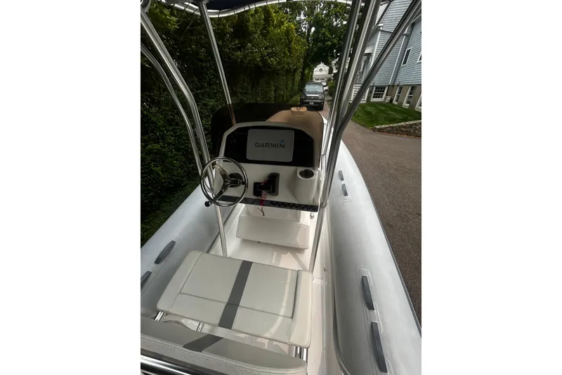 Slide: The Image of 2022 AB Inflatables Nautilus 19 DLX boat interior with Garmin navigation system. - 10