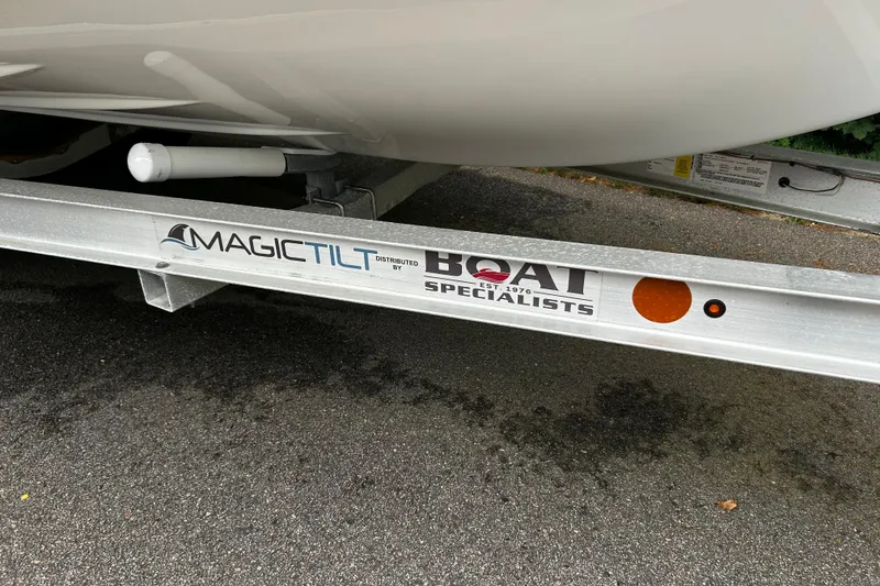 Slide: The Image of Trailer for 2022 AB Inflatables Nautilus 19 DLX, featuring Magic Tilt branding. - 12
