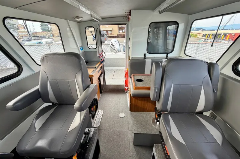 Slide: The Image of Interior of 2018 Hewescraft 260 Pacific Explorer with seating and windows. - 5