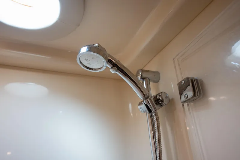 Slide: The Image of Showerhead in 2006 Sea Ray 455 Sedan Bridge yacht bathroom. - 24
