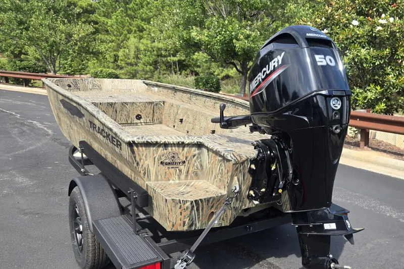 The Image of 2026 Tracker Grizzly 1650 T Prairie Wings Edition boat with Mercury 50 outboard motor. - 0