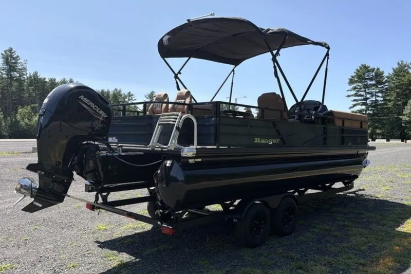 Slide: The Image of 2026 Ranger 220FC pontoon boat with canopy and Mercury outboard motor in a scenic setting. - 5