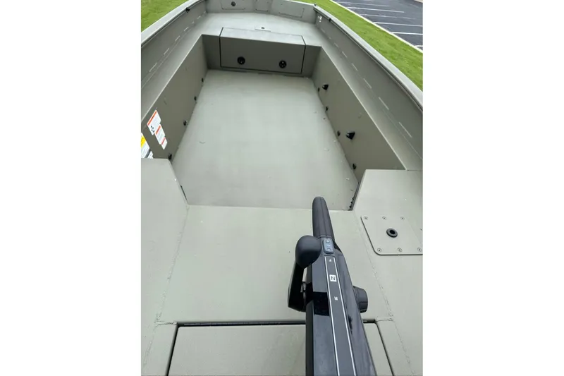 Slide: The Image of 2026 Tracker Grizzly 1650 T Prairie Wings Edition boat interior, showcasing spacious seating and controls. - 9