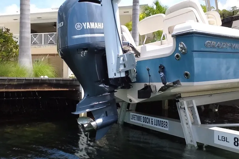 Slide: The Image of 2021 Grady-White 251 Coastal Explorer with Yamaha engine on dock lift. - 9