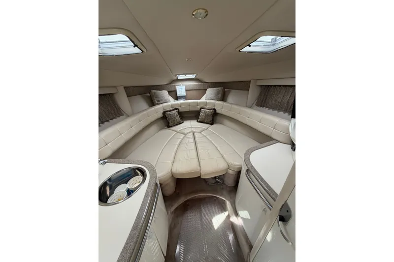 Slide: The Image of Interior of 2002 Formula 27 Performance Cruiser with plush seating and modern amenities. - 15