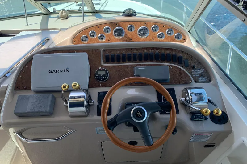 Slide: The Image of Control panel of a 2000 Sea Ray Sundancer 310 boat with Garmin navigation system. - 16