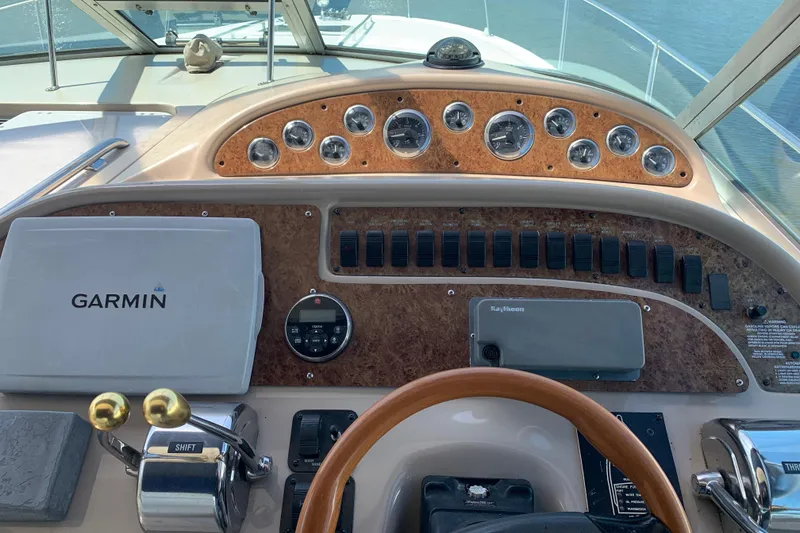 Slide: The Image of Control panel of a 2000 Sea Ray Sundancer 310 boat with Garmin navigation system. - 17