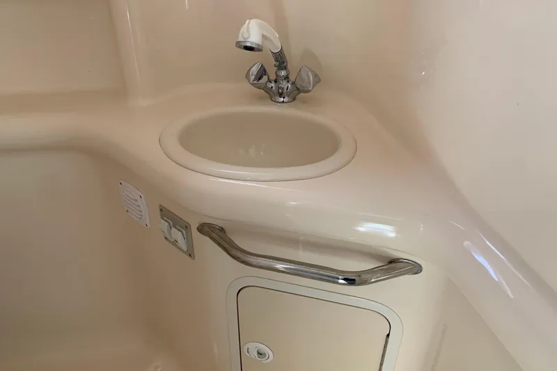 Slide: The Image of Interior sink area of a 2000 Sea Ray Sundancer 310 boat. - 31