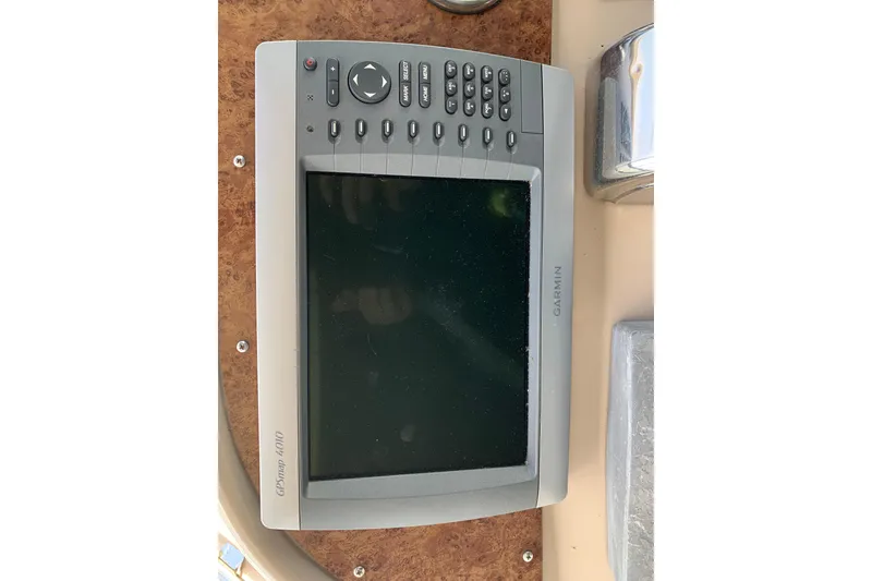 Slide: The Image of Garmin GPS device on 2000 Sea Ray Sundancer 310 boat dashboard. - 18