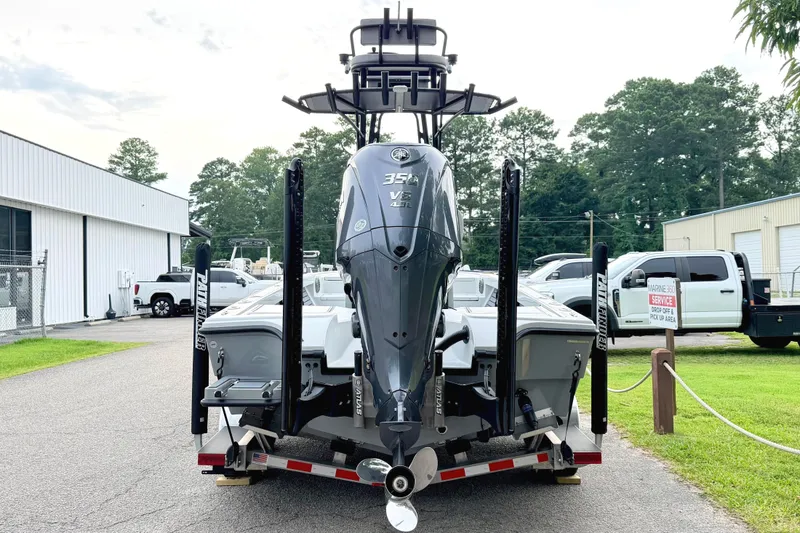 Slide: The Image of A 2026 Pathfinder 2500 Hybrid on a trailer, featuring a powerful outboard motor. - 3