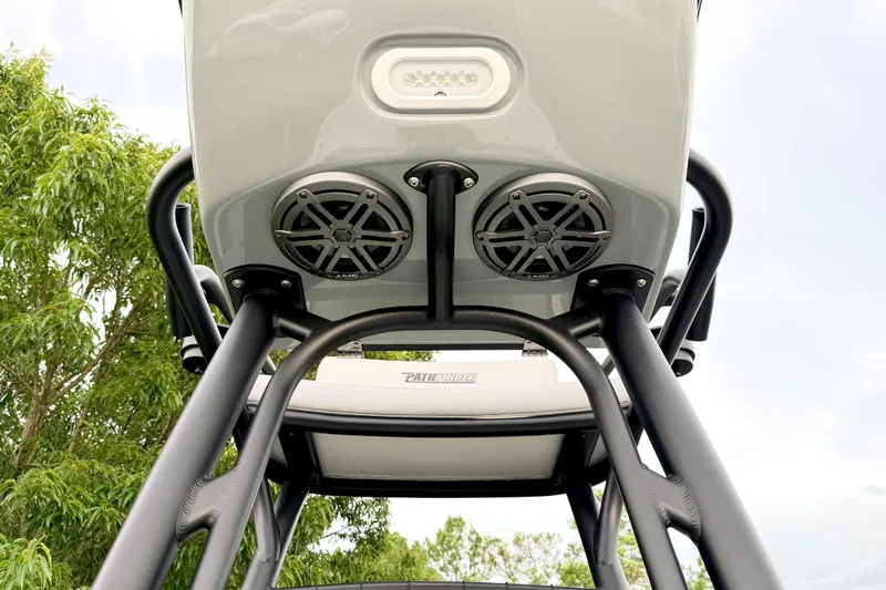 Slide: The Image of Close-up of a Pathfinder 2500 Hybrid T-top with speakers and lighting. - 10