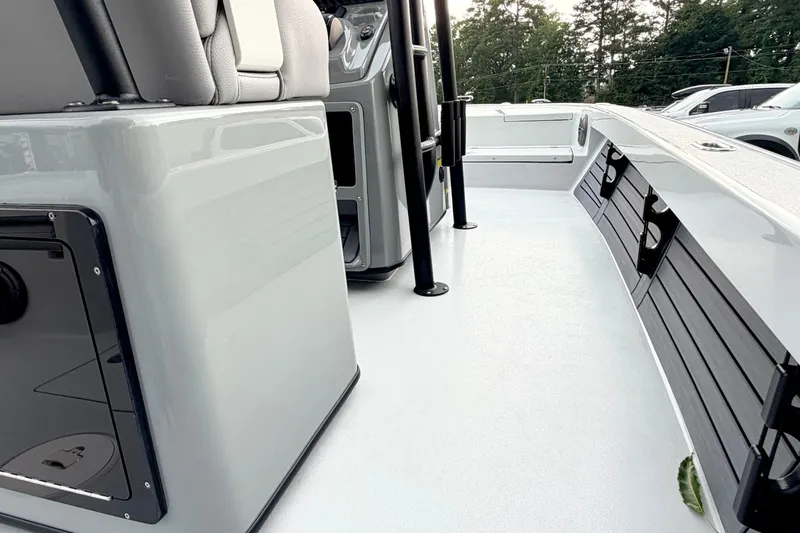Slide: The Image of Interior view of 2026 Pathfinder 2500 Hybrid boat, showcasing sleek seating and storage. - 15