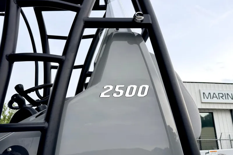 Slide: The Image of Close-up of 2026 Pathfinder 2500 Hybrid boat detail with visible branding. - 21