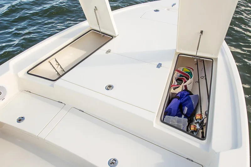 Slide: The Image of Manufacturer Provided Image: 2026 Pathfinder 2500 Hybrid boat storage compartments with fishing gear and accessories. - 31