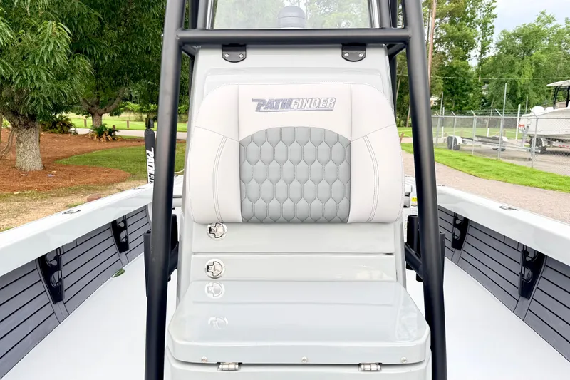 Slide: The Image of 2026 Pathfinder 2500 Hybrid boat interior with cushioned seating and sleek design. - 9