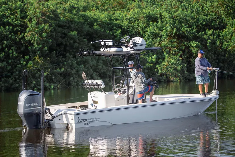 Slide: The Image of Manufacturer Provided Image: 2026 Pathfinder 2500 Hybrid boat with anglers fishing on a calm river. - 27