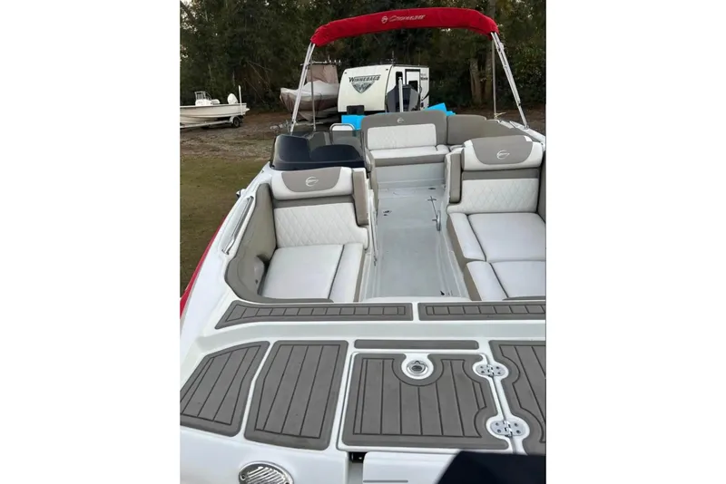 Slide: The Image of 2021 Crownline Eclipse E205 XS boat interior with spacious seating and modern design. - 7