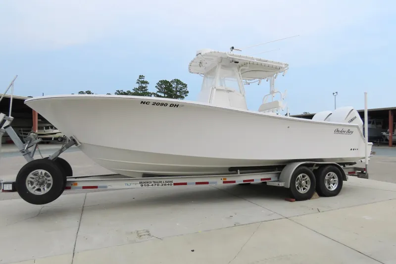 Slide: The Image of 2008 Onslow Bay 27 Offshore Edition boat on trailer, side view. - 6