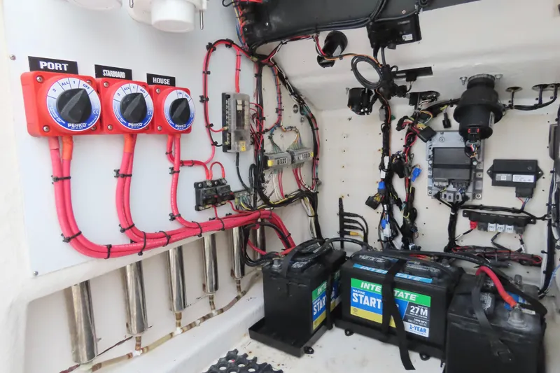 Slide: The Image of Electrical system of a 2008 Onslow Bay 27 Offshore Edition boat, featuring batteries and wiring. - 20