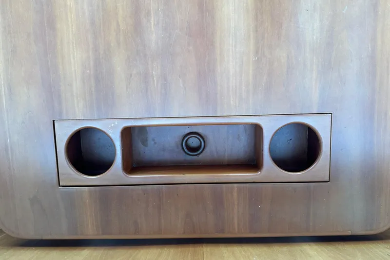 Slide: The Image of Wooden panel with cup holders and storage, True North 38 Heritage, 2007 model. - 114