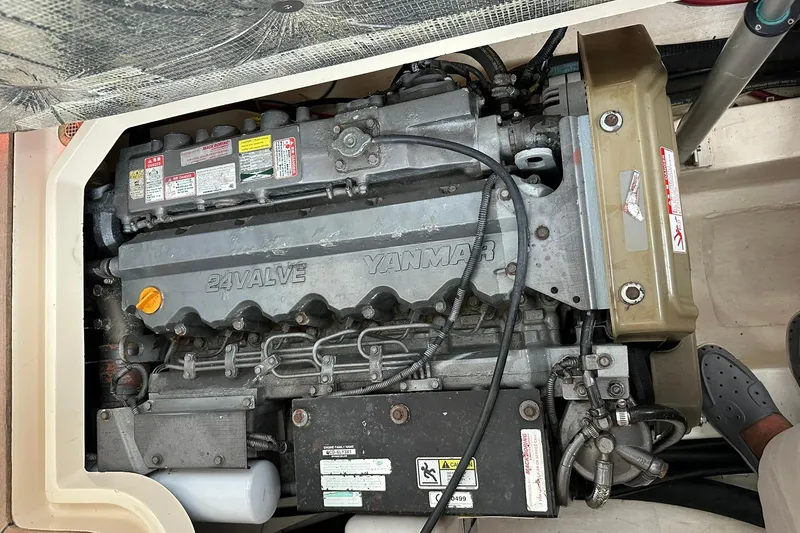 Slide: The Image of Engine compartment of a 2007 True North 38 Heritage boat with Yanmar 24-valve engine. - 100