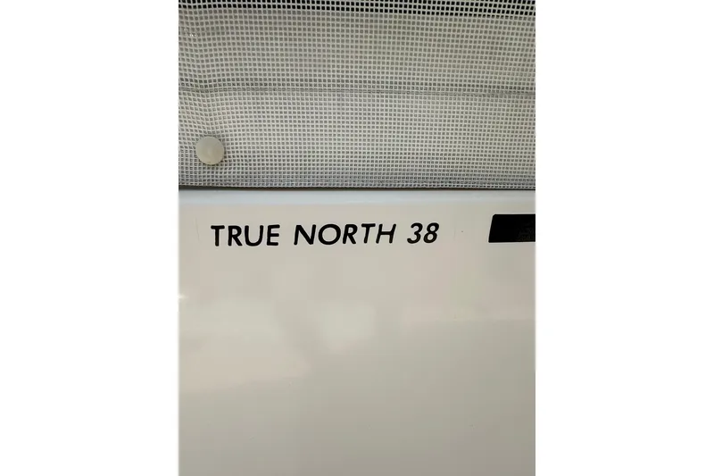 Slide: The Image of 2007 True North 38 Heritage boat nameplate detail. - 3