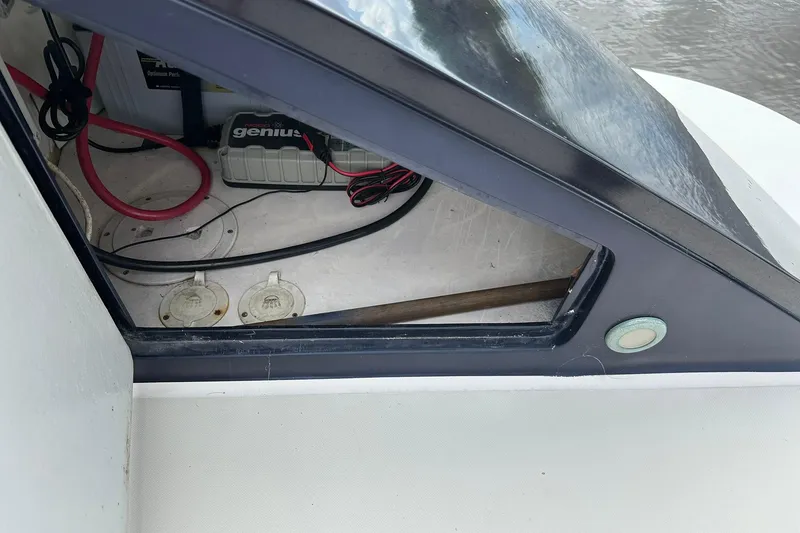 Slide: The Image of Interior view of 2007 True North 38 Heritage boat showing battery and wiring. - 20