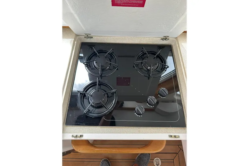 Slide: The Image of Stovetop with four burners on a 2007 True North 38 Heritage boat. - 66