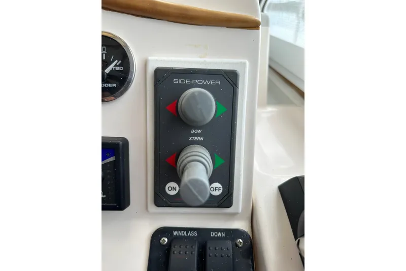 Slide: The Image of Control panel of a 2007 True North 38 Heritage boat with Side-Power joystick. - 69