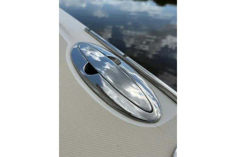 Slide: The Image of Close-up of a 2007 True North 38 Heritage boat's polished metal cleat on deck. - 38