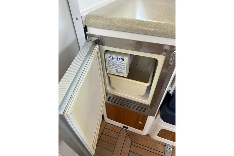 Slide: The Image of Open ice maker on 2007 True North 38 Heritage boat, featuring Icer-Ette system. - 57