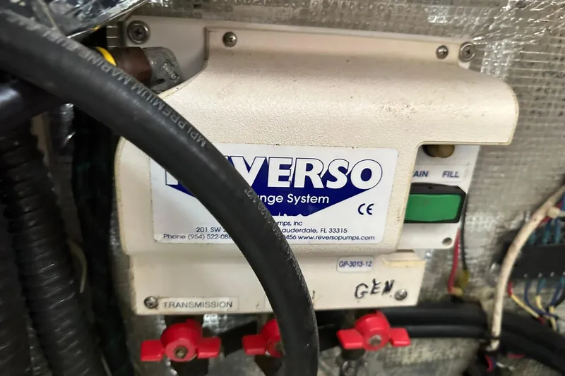Slide: The Image of Reverso oil change system in 2007 True North 38 Heritage boat engine compartment. - 95