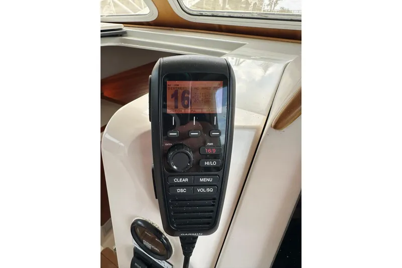 Slide: The Image of Boat radio equipment on 2007 True North 38 Heritage yacht dashboard. - 91