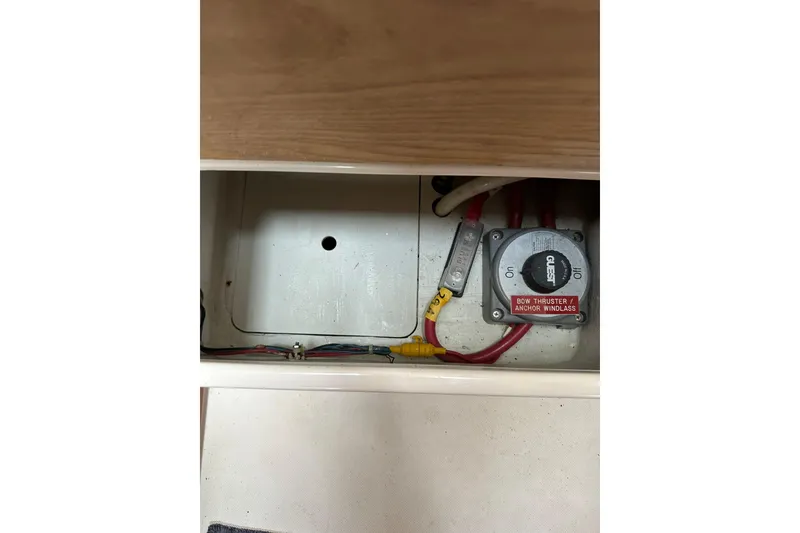 Slide: The Image of Electrical panel of 2007 True North 38 Heritage boat, featuring bow thruster and anchor windlass controls. - 117