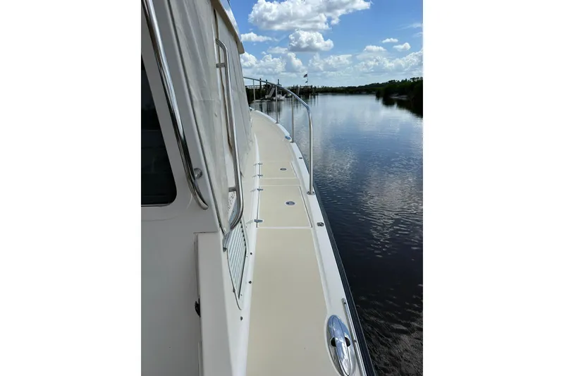 Slide: The Image of 2007 True North 38 Heritage yacht deck with scenic water view. - 26