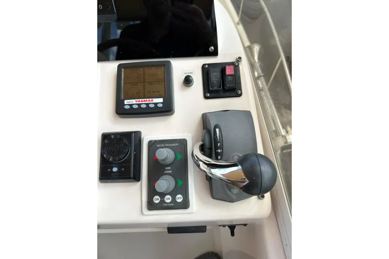 Slide: The Image of Control panel of a 2007 True North 38 Heritage boat with Yanmar display. - 40