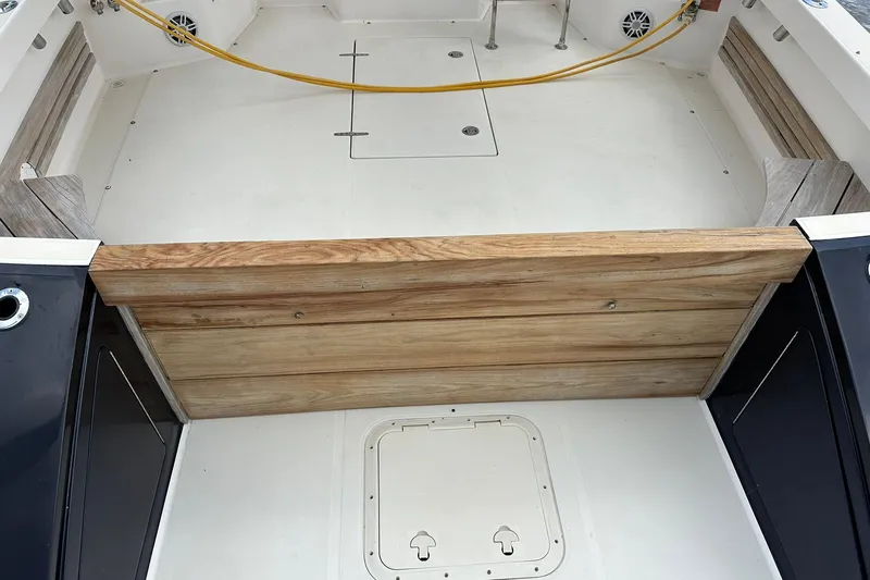 Slide: The Image of Cockpit of 2007 True North 38 Heritage boat with wooden accents and clean deck. - 18